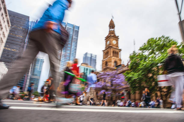 istock Sydney downtown, blurred intersection people and traffic 856905898