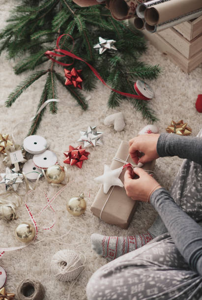 istock Human hand preparing gifts at Christmas 856912212