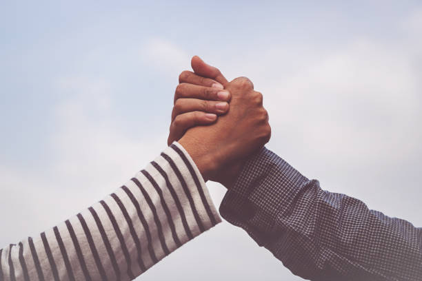 Two hand handshake friendly,hand in teamwork concept stock photo