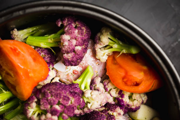 istock Vegetables and chicken in bowl ready for stewing 856916208