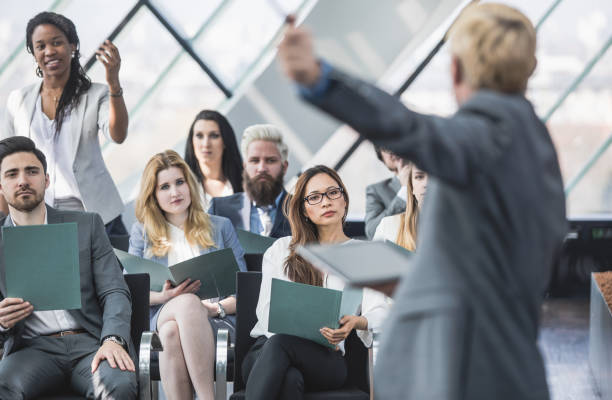 istock Business People on Conference Listening to Speaker 856916532