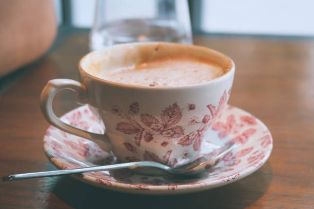 istock A cup of latte / caffe latte in vintage style. 856916870