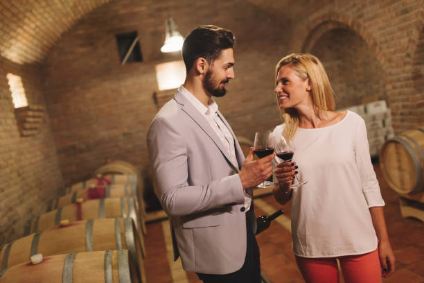 istock Wine loving couple degustating wines 856917600