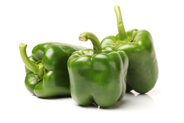 istock Green capsicum isolated on white background 856927250