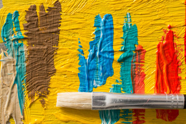 istock Abstract painting background with paintbrush. Wallpaper for a painter exhibition or paint factory 856935458