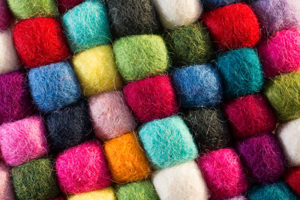 istock Geometric background with balls of colored synthetic wool 856939004