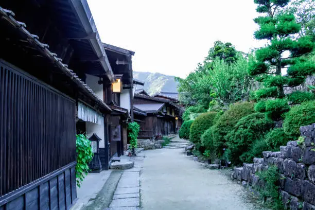 Kiso valley is the old  town or Japanese traditional wooden buildings for the travelers walking at historic old street  in Narai-juku , Nagano Prefecture, JAPAN.