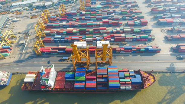 istock aerial view container harbor with crane, top view 856939480