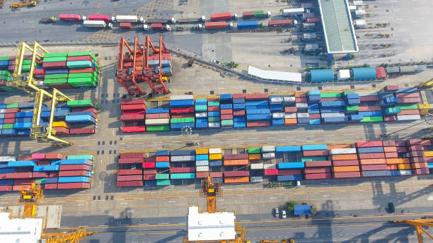 istock Logistics and transportation of Container Cargo ship and Cargo working crane bridge in shipyard 856939922