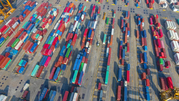 istock aerial view container harbor with crane, top view 856940000