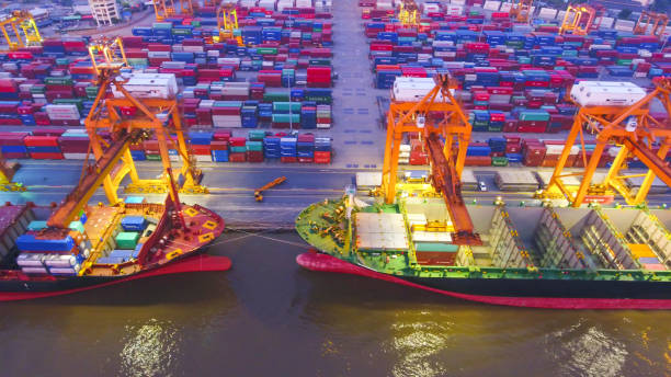 istock aerial view container harbor with crane, top view 856940088