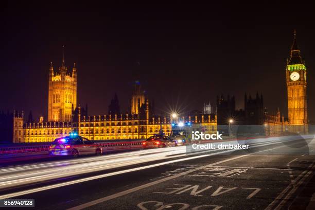Police Cars And Ambulance On Westminster Bridge London At Night With The Houses Of Parliament And Big Ben Stock Photo - Download Image Now