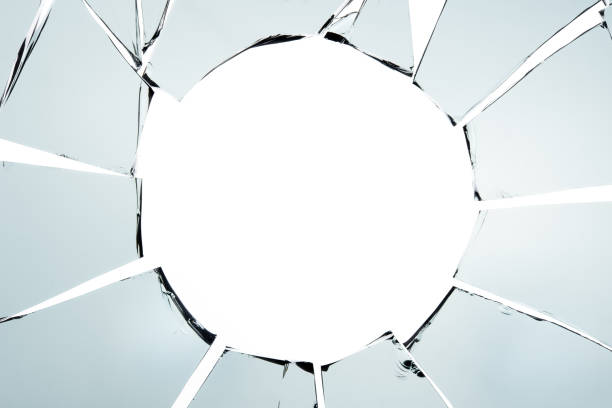istock Broken glass and hole isolated on white texture wallpaper background  object design crash accident concept 856940336