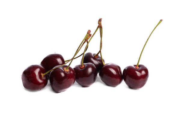 istock Ripe, washed appetizing and tasty bright red cherries on a white isolated background 856944140