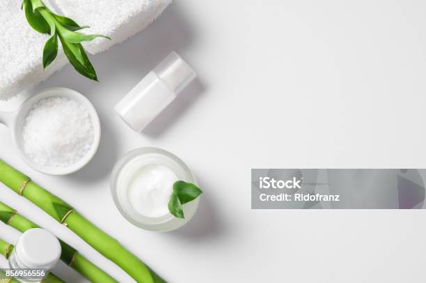 Moisturizer With Bamboo Sticks Stock Photo - Download Image Now - Bamboo - Plant, Backgrounds, Flat Lay