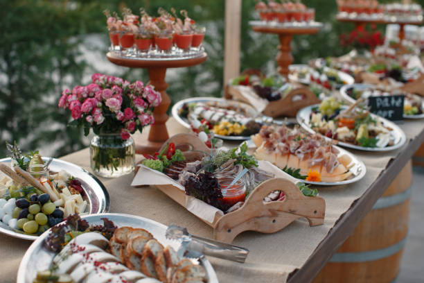 istock Outdoors fourchette table with italian appetizers and fresh flowers 856969808