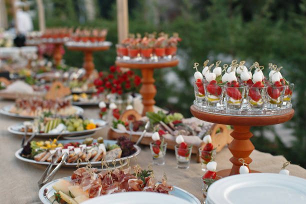 istock Outdoors fourchette table with italian appetizers and fresh flowers 856969874