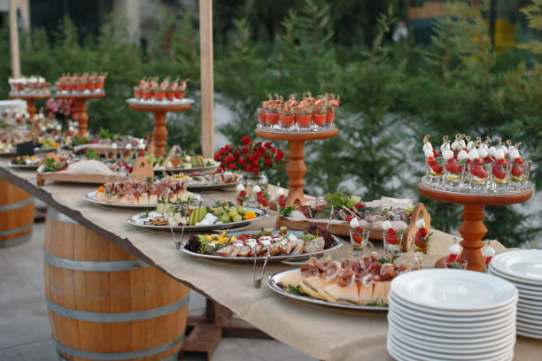 istock Outdoors fourchette table with italian appetizers and fresh flowers 856969894