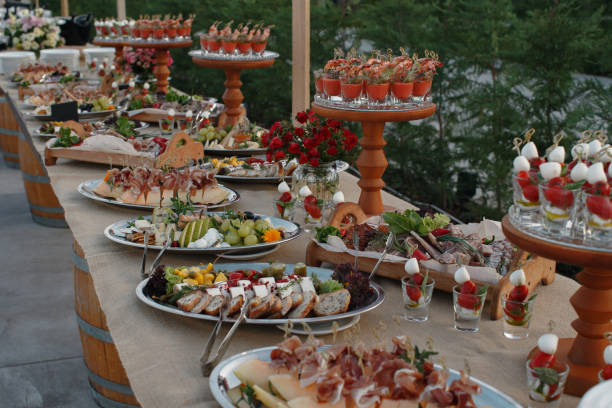 istock Outdoors fourchette table with italian appetizers and fresh flowers 856969972