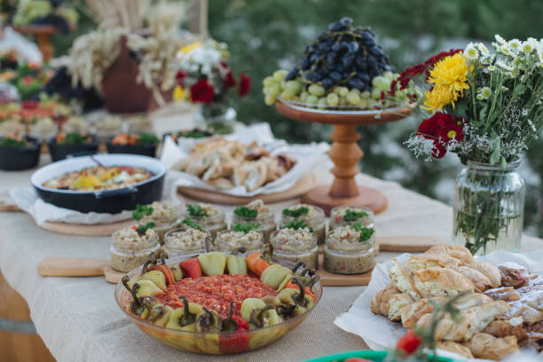 istock Outdoors fourchette table with traditional moldavian appetizers and fresh flowers 856970014
