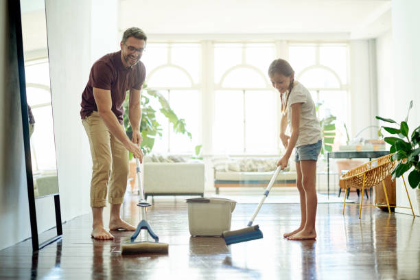 istock Teaching his daughter his awesome cleaning skills 856970220