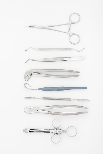 Stainless steel food tongs on white background