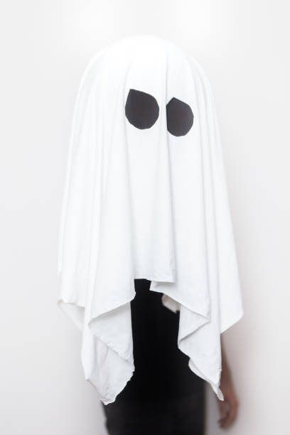 Halloween Man hiding behind ghost. Halloween decoration 3686 stock pictures, royalty-free photos & images