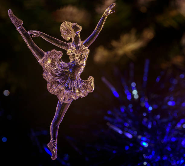 istock Glass ballet dancer on Dark background. Old style. Selective focus 856980228