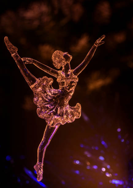 istock Glass ballet dancer on Dark background. Old style. Selective focus 856980278