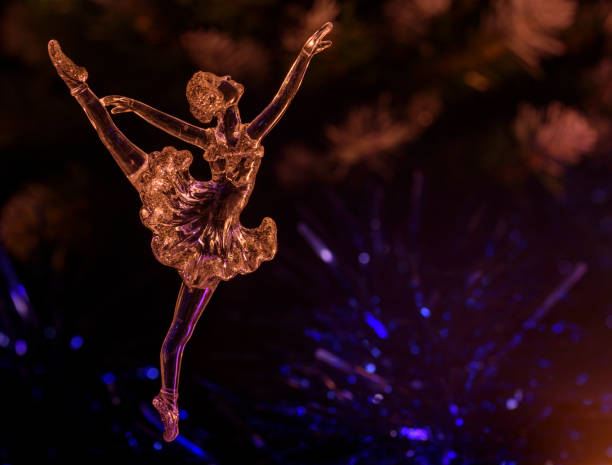 istock Glass ballet dancer on Dark background. Old style. Selective focus 856980382