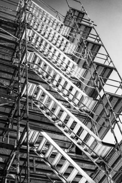 istock Renovation of facade many stairs scaffolding construction 856980826