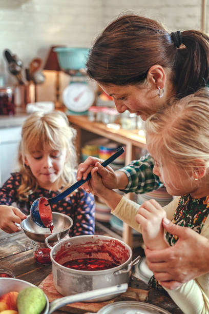 istock Preparing Homemade Strawberry Jam and Canning in Jars 856980984