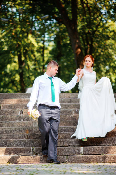 istock The bride and groom in the Park. 856981590