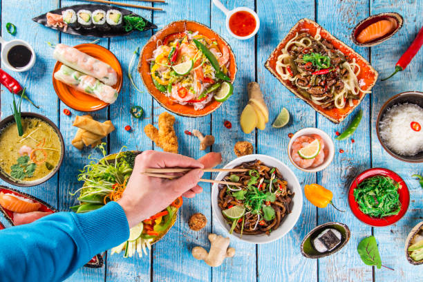 istock Various of asian meals on rustic background , top view , place for text 856984112