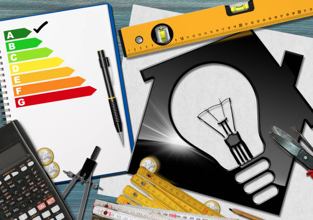 istock Energy Efficiency Rating - House with Light Bulb 856984618