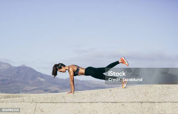Muscular Woman Doing Core Exercise Outdoors Stock Photo - Download Image Now - Exercising, One Woman Only, Push-ups