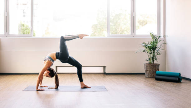 istock Woman practicing yoga for good health 856990288