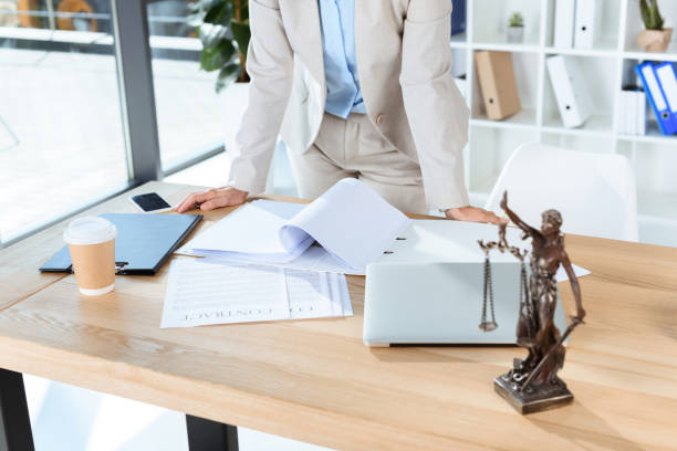 istock businesswoman with documents at workplace 857001334