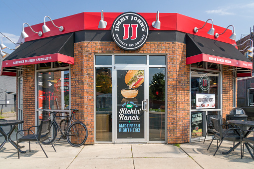 Jimmy John's restauraut exterior. Jimmy John's is an American fast food restaurant franchise that sells submarine sandwiches and salads.