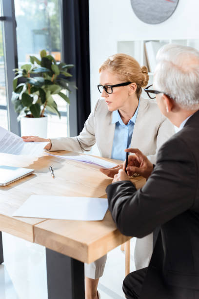 istock business colleagues discussing contract 857004952