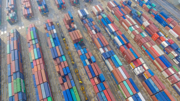 istock Container Cargo freight ship with working crane bridge in shipyard in singapore 857005452