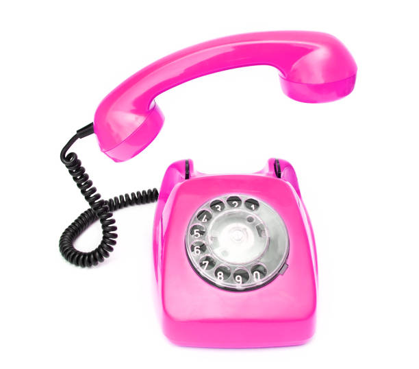 istock Pink retro telephone isolated on white background 857006126
