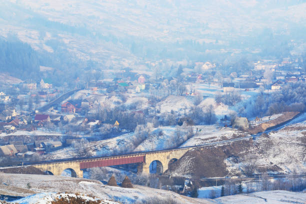 istock Winter evening in a beautiful mountain village 857010402