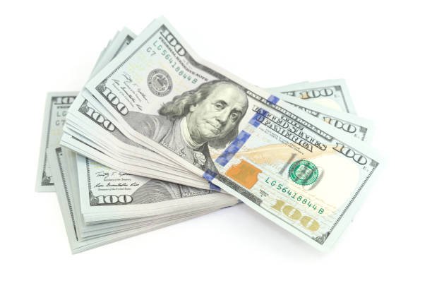 istock Bundle of One Hundred Dollars isolated on white 857015262