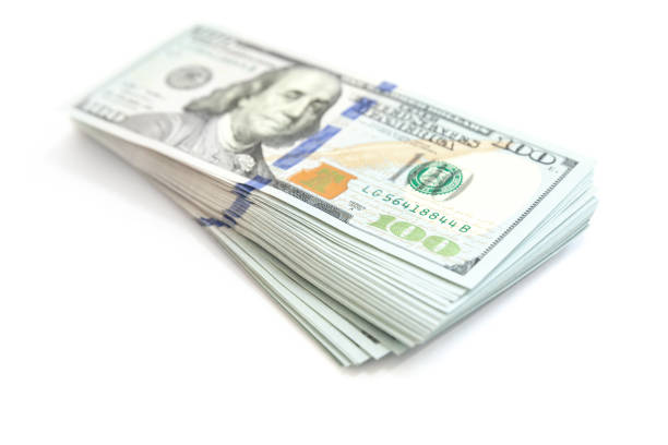 istock Bundle of US 100 Dollars isolated on white 857015294