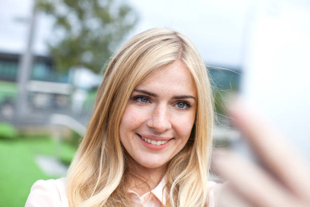 istock Young woman taking a selfie 857016502