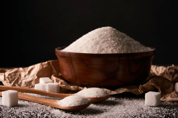 istock Bowl and spoon full of sugar 857017958