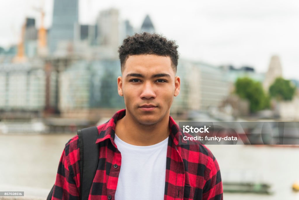 British youth Horizontal color portrait of a mixed race urban young man in London downtown. London - England Stock Photo