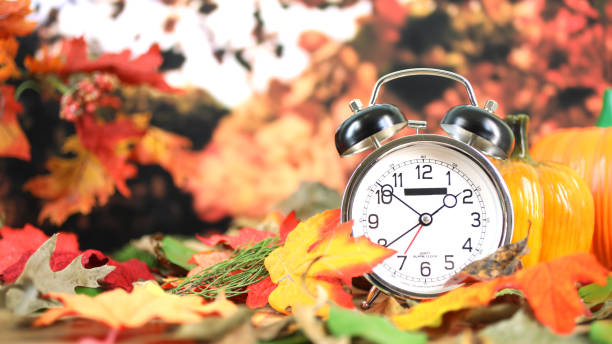 istock Daylight savings time.  2 o'clock time on clock in autumn season. 857029078
