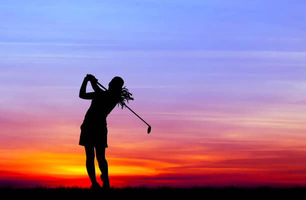 istock silhouette golfer playing golf during beautiful sunset 857031798